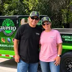 Jose and Holly Cedillo in front of their Tupelo trailer
